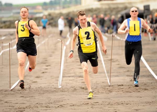 Runners taking part in events on the sands at the 2019 Kirkcaldy Beach Highland Games. Pic credit- WALTER NEILSON.