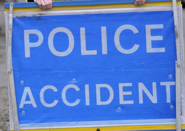 Police say the road was closed while emergency services dealt with the crash.
