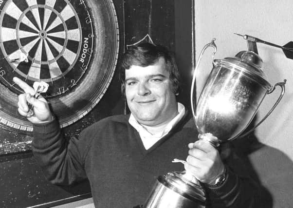 Jocky Wilson in Kirkcaldy with the Embassy Darts World Championship trophy
