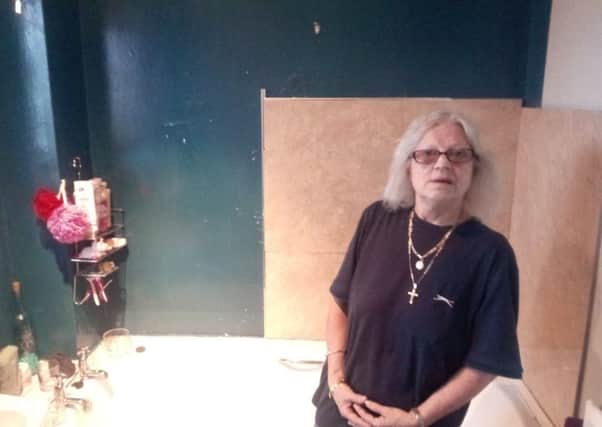 Janet Elder's bathroom is thought to be 30 years old and mould grows back no matter how often it is cleaned.