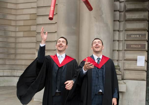 Twins Connor (left) and Callum Clark who graduated from Edinburgh Napier University Pic: Adam Shedlock