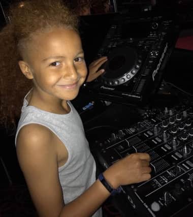 Jaxxson Shields (9) on the decks! He is just one of a number of youngsters who will be attending the tots disco at Kitty's on Saturday.