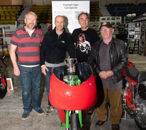 The Group of riders; left to right - Charlie Wright, bike restorer Richard Whittaker with the Peter Victory Challenge Trophy and Mike Czyzewski and Cliff Lawson. Pic: RD Photography