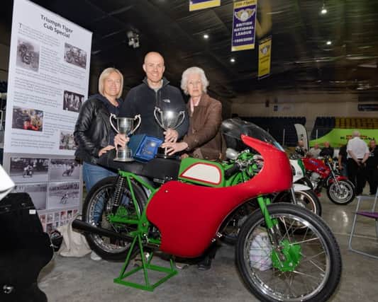 Richard Whittaker with his late father Alan's racer with his wife and mother who made the journey from Wakefield for the show. Pic: RD Photography.