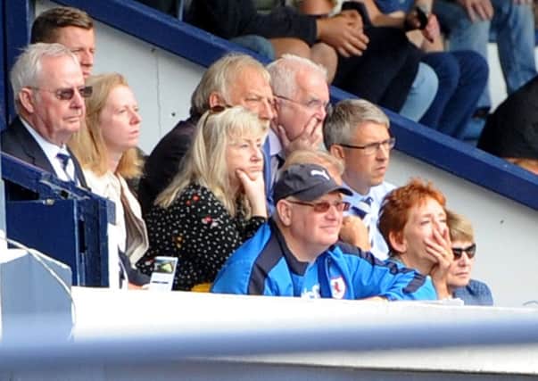 John McGlynn sits in the Directors' Box after being ordered from the dugout (All pics by Fife Photo Agency)