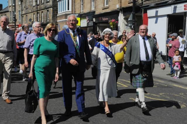 Fife Provost Jim Leishman led the parade along with Kirkcaldy and Cowdenbeath MP Lesley Laird and honorary Games chieftain David Adamson. Pic: George McLuskie.