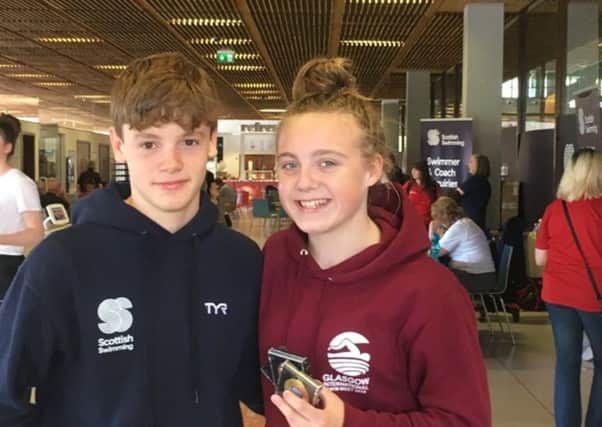 Mark Scott and Erin Taylor of Fins Swimming Club
