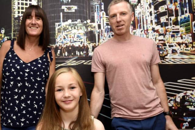 Rosie Good with mum Lisa & dad Alan (Pic: Fife Photo Agency)