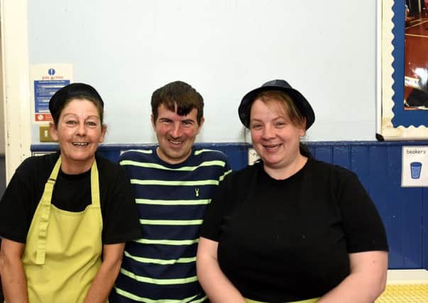Cafe Inc. volunteers at Kirkcaldy West Primary. From left, Gail Howard, Mark Anderson and Denise Smith.