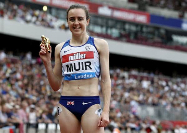 Britain's Laura Muir celebrates winning the Women's 1500m event during the the IAAF Diamond League Anniversary Games athletics meeting at the London Stadium. (Photo by Ian KINGTON / AFP)