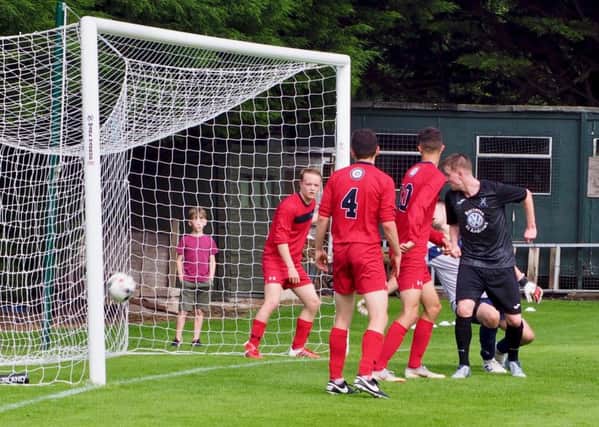 St Andrews United, in black kit, hit the net three times last Saturday - but it was a different story in midweek.
