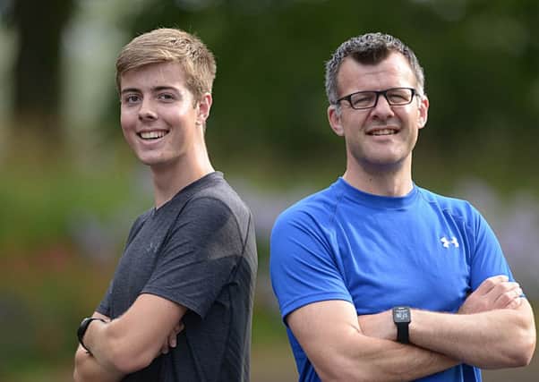 Father and son Craig and Ben MacDonald who are running the half marathon together. Pic: George McLuskie.