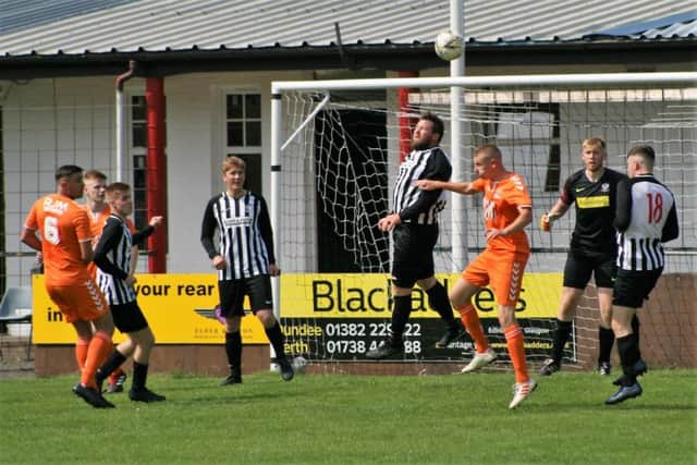 Newburgh clear their lines on the way to a win against Syngenta Juveniles. Pic by Graham Strachan.