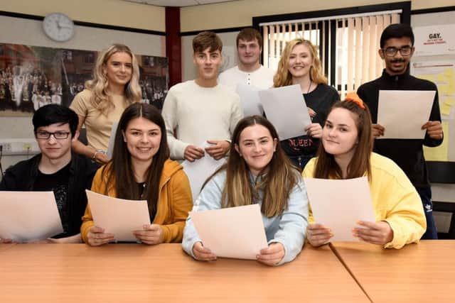 Senior pupils at Kirkcaldy High with their exam results. Pic: Fife Photo Agency.