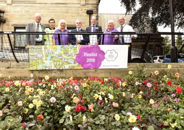 Britain in Bloom judges Bill Ronald and James Cordingley (centre) visit Kirkcaldy with Provost Jim Leishman, gardener Jordan Cooper , Alice Soper and Judith Kerr from Growing Kirkcaldy and Steven Duffy from Fife Council. Pic:  WALTER NEILSON