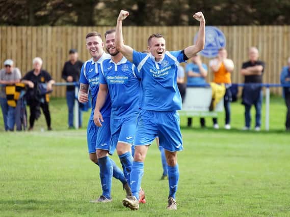 Mikey Ness celebrates after his spectacular strike put Dundonald ahead with 15 minutes left. Pic: George Wallace