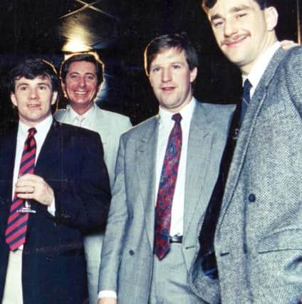 Roger Howell with Liverpool players Ray Houghton, Ronnie Whelan and John Aldridge.