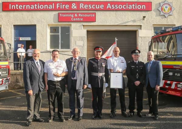 IFRA receives its Queen's Award from Robert Balfour, Lord-Lieutenant, with Provost Jim Leishman, , David Kay IFRA director;  Fire Chief Roddie Keith, Cllr Ross Vettraino and former Deputy Lieutenant Graham Bennet