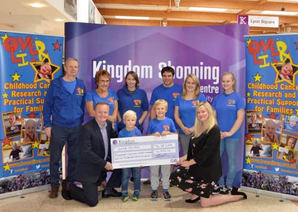 The team at Kingdom Shopping Centre  presented a cheque to representatives from Love Oliver this week for £14,302.22.