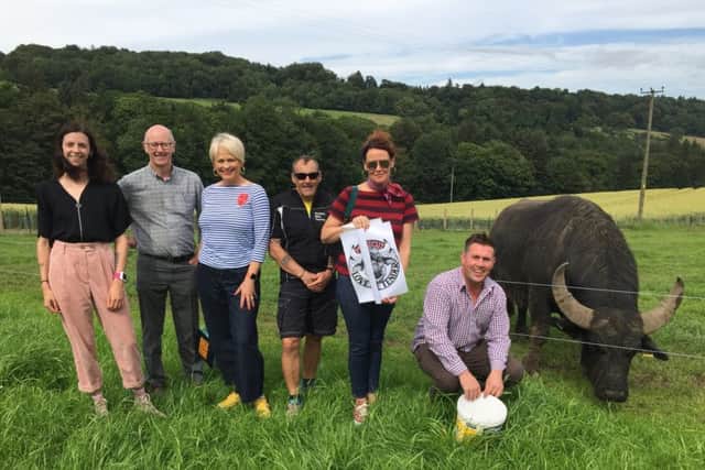 Members of the Kirkcaldy Half Marathon organising committee along with event sponsors Susan McGill of Susan McGill Designs and Steve Mitchell from The Buffalo Farm.