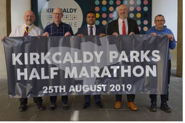 Kirkcaldy Half Marathon sponsorship deal with the new owner of Kirkcaldy Centre. From left: Jim Buchan, Cllr Alastair Cameron,  Tahir Ali, Cllr Neil Crooks and Jim Taylor official event organiser.