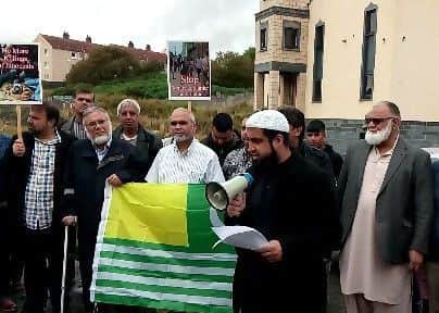 Imam Mansoor leading the protest.