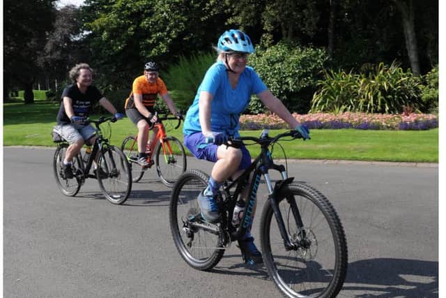 George McDermid, David Ferrier, Helen Ferrier with their bikes at Beveridge Park.  Pic: George Mcluskie