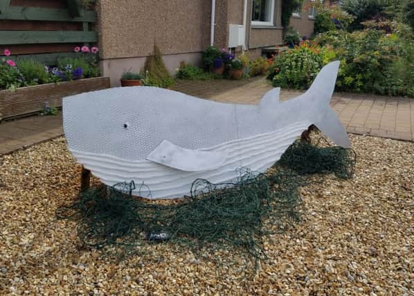 A whale scarecrow in Kinghorn commemorates the one who died in the Forth through being entangled in plastic netting.