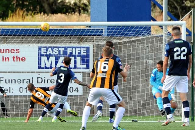 A let off for Raith as Ryan Wallace hits the bar with David McGurn well beaten.