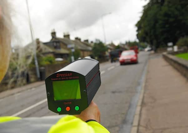 Watching for speeding drivers on Carslogie Road.