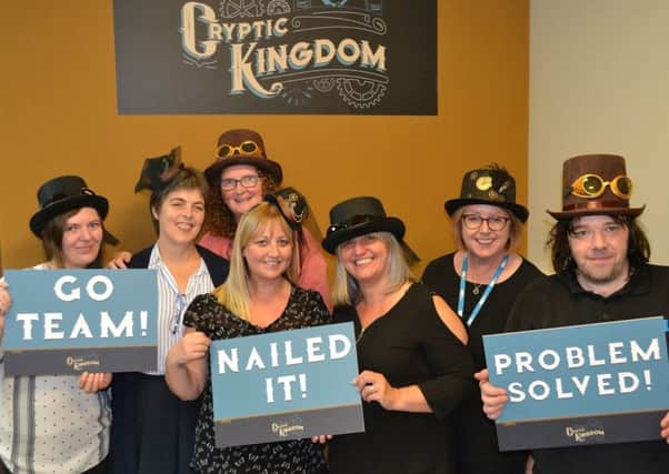 Staff from Rothes Halls, Glenrothes, were one of the first teams to have a sneak preview of the new Cryptic Kingdom escape room. From left, Sarah Napier, Margo Waddell, Janet Lawson, Caroline Livingston, Debbie McCreary, Susan Turnbull and Billy Smith.