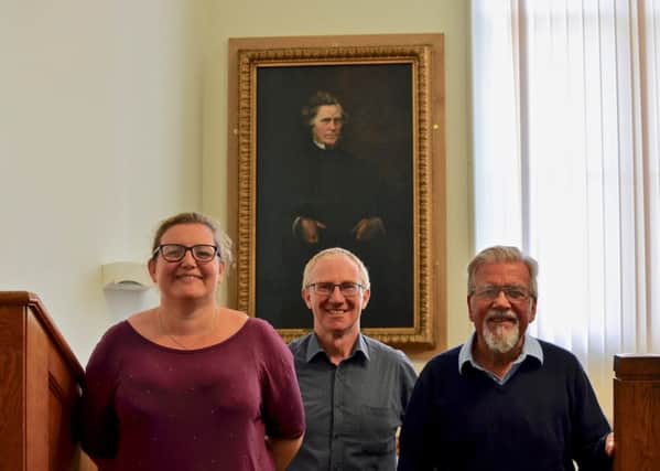 Louise McEwan of the East Neuk Centre, Gavin Grant of Fife Cultural Trust, and Glenn Jones of the Anstruther and Kilrenny Burgh Collection, with the portrait of Thomas Black