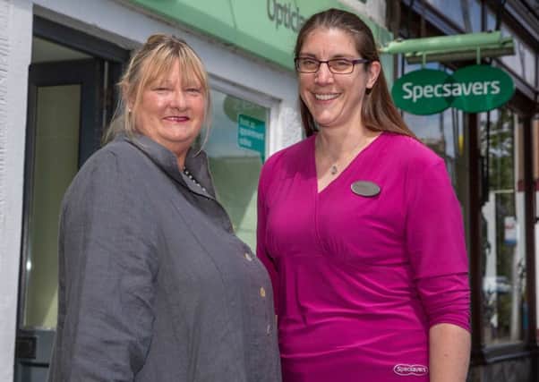 Alison Wright with Specsavers optician Kirsty Bidgood