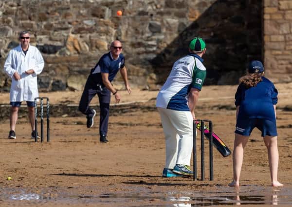 Head of Cricket Scotland (and honorary Wildcat for the day) Malcolm Cannon bowling against the Ship Inns Ed Anderson. Pic by Dennis Penny.