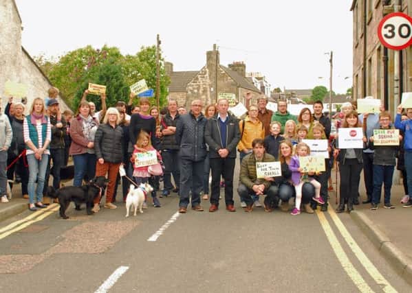 The community council supported a campaign against a housing proposal.