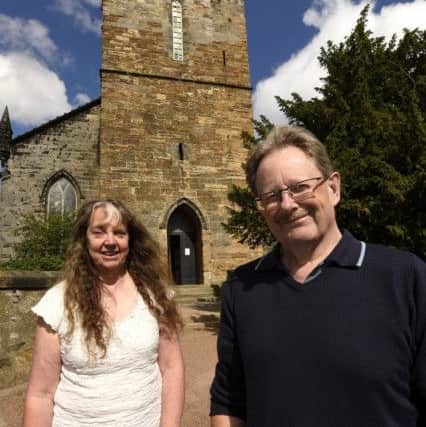 Rosemary Potter and George Proudfoot from Kirkcaldy Old Kirk Trust with the tower in background. Pic:  WALTER NEILSON