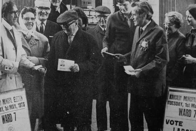 Council elections in Kirkcaldy, 1973 - left is Alan H. Potter (Ratepayers Party) along with George F. Moss (Labour) canvassing voters outside Pathhead Halls