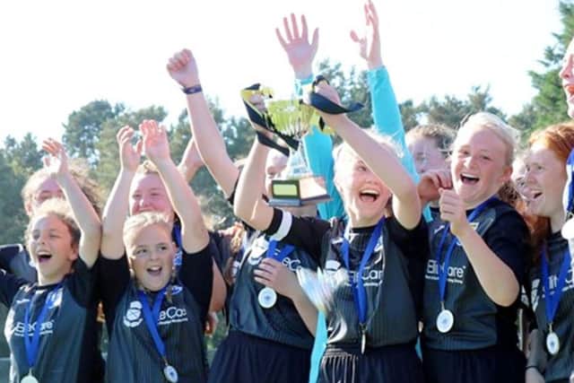 East Fife celebrate winning the Scottish Women's Football U15 League Cup, beating Raith Rovers 3-1.