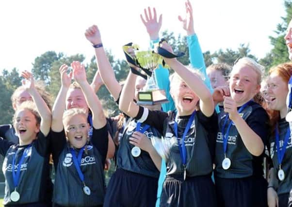 East Fife celebrate winning the Scottish Women's Football U15 League Cup, beating Raith Rovers 3-1.