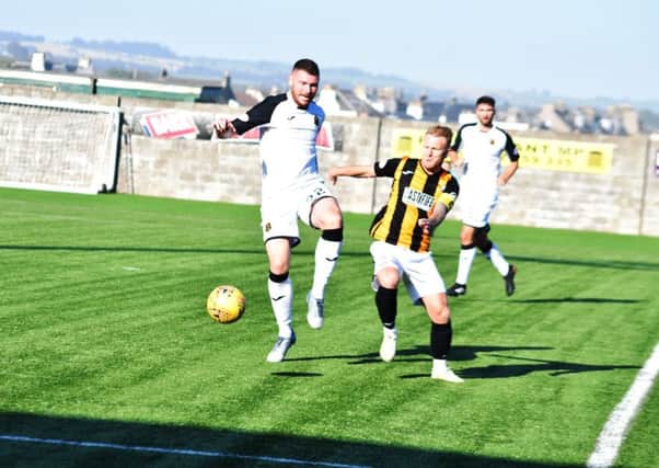 Scott Agnew challeneges for the ball during the 2-2 draw against Dumbarton (Pics by Kenny Mackay)