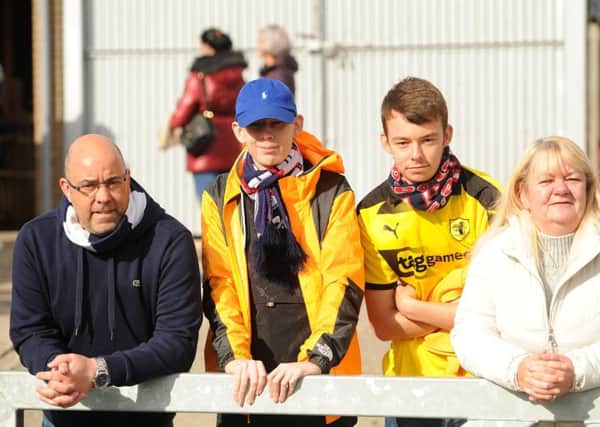 From left, dad Stuart, Lee, his brother Cameron, and mum Michelle, at the Forfar game on Saturday.