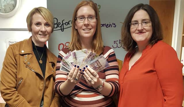 Kate McCormack, manager of Fife Women's Aid and award organisers Cara Forrester and Annie Crow.
