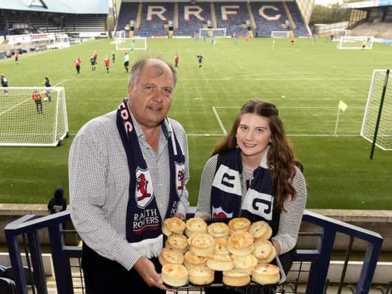 John Simpson, from BWS Catering, along with daughter Brooke, promote the Pie for a Player fundraiser at Stark's Park. Pic: Fife Photo Agency