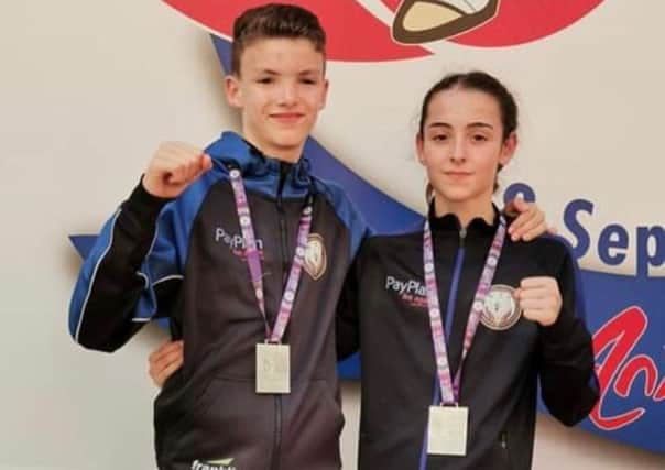 Mark Cuggy and Carmen Feeney won silver medals at the IFMA World Youth Muay Thai Championships in Antalya, Turkey.