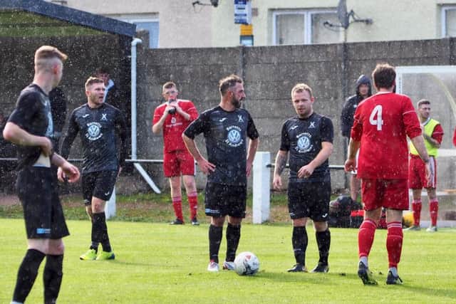 The rain, and the goals, fell at Barnetts Park. Pic by Blair Smith.