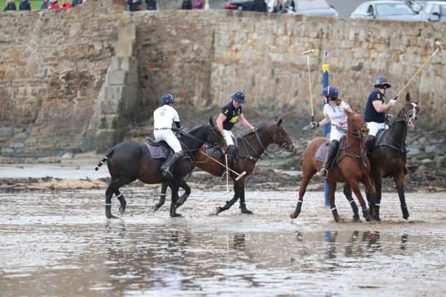 The action was keenly contested on Elie's sands. Pic by Dennis Penny.