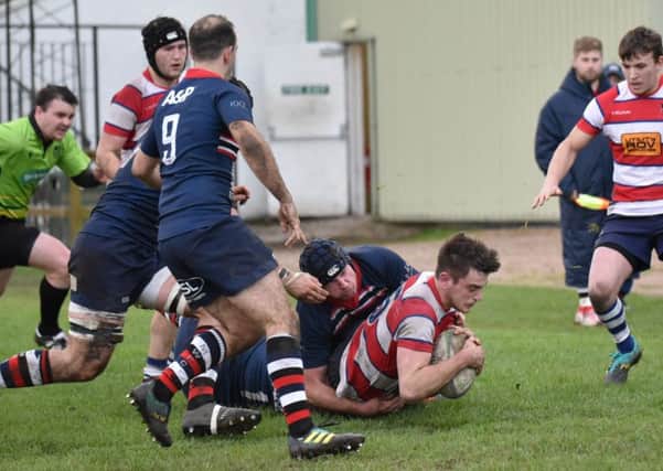 Will Howley scores Howe's final try to extend their lead. Pic by Chris Reekie.