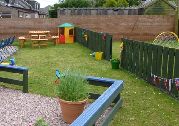 Land next to Salvation Army hall in Lochgelly transformed into a community garden by people on community payback orders.