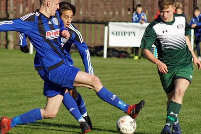Burntisland's Sandy Strang in the thick of the action.