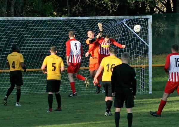 Newburgh force pressure on the Pumpherston goal. Pic by Graham Strachan.